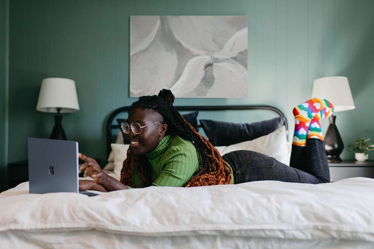 A person completing a private online wellbeing check at home